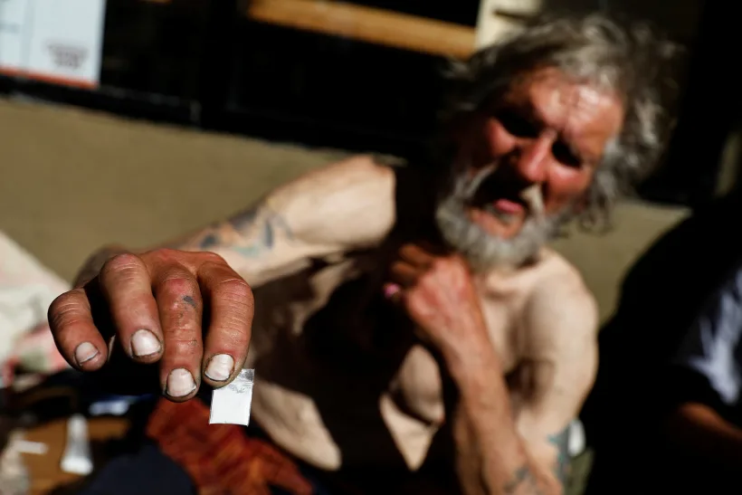 Travis Hayes Holds Up A Bag Of What He Says Is The Synthetic Drug Fentanyl After San Francisco Mayor London Breed Held A News Conference Introducing Legislation In Curbing The Rise Of Deadly Overdoses In The City, San Francisco