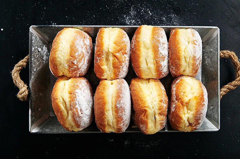 Sufganiyot,donuts,with,jelly,on,black,background