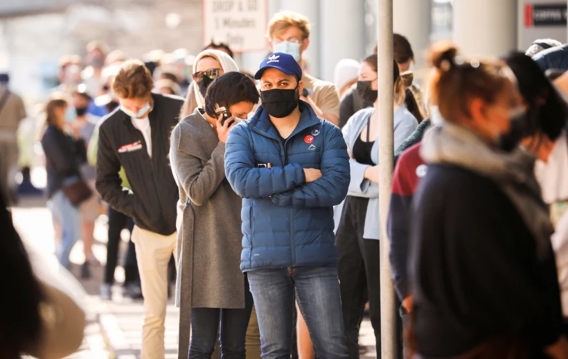 People Queue Outside A Coronavirus Disease (covid 19) Vaccination Centre In Cape Town