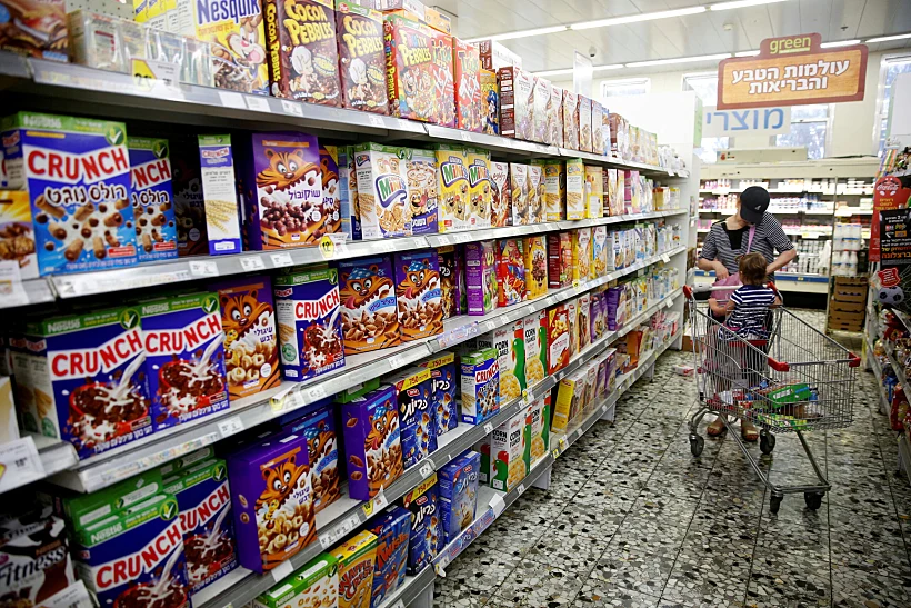 File Photo: A Woman Shops At A Supermarket In Jerusalem