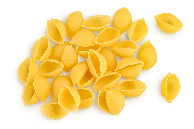 Uncooked,dried,conchiglie.,raw,organic,shell,pasta,isolated,on,white