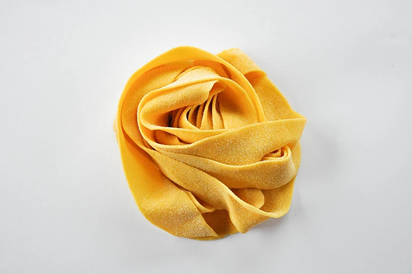 Handmade,pasta,pappardelle,isolated,white,background