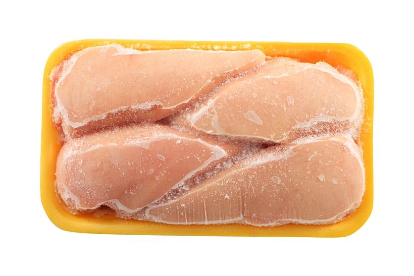 Frozen,chicken,meat,on,a,white,background