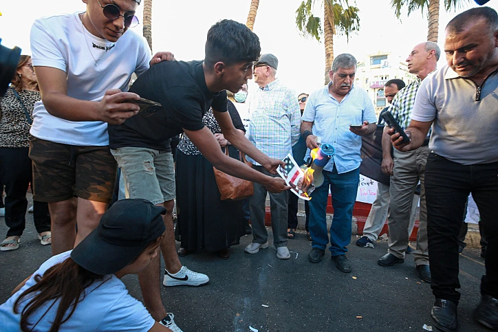 מחאה גם בדמות שריפת דגל ארה''ב בבית לחם