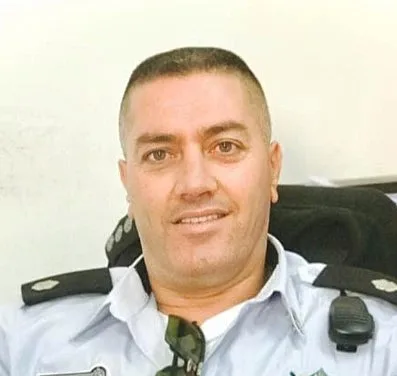 רני באשא, שימש קצין המודיעין בכלא גלבוע