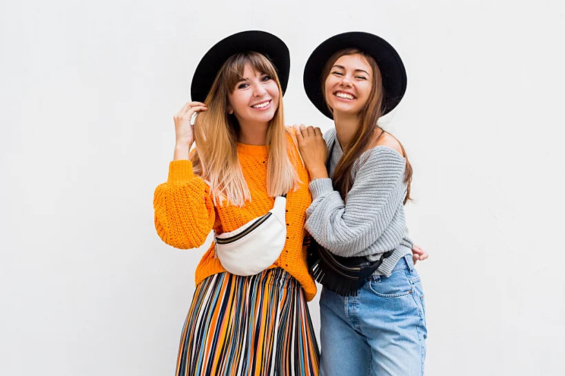 Best,friends,embracing,,,couple,of,stylish,girls,posing,on