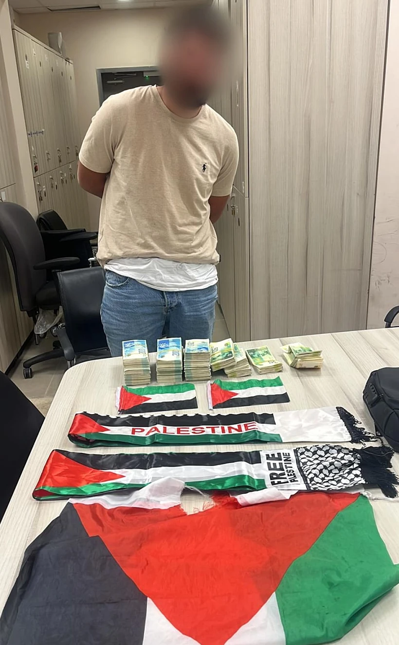 חשוד נוסף שנעצר, על רקע דגלי פלסטין שנתפסו שועפאט טרור חרבות ברזל