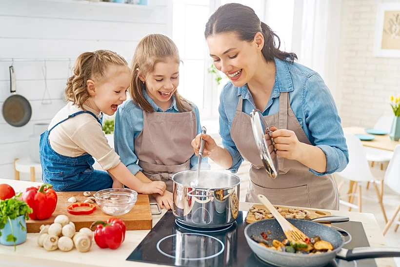 Happy Family In The Kitchen.