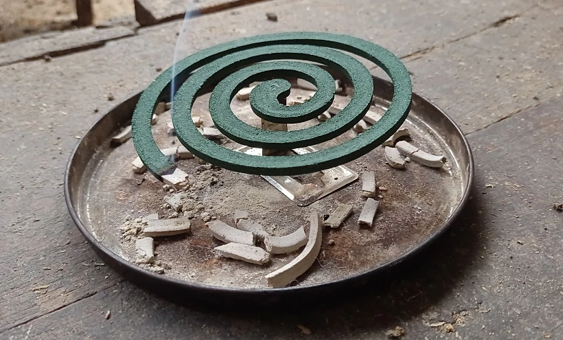 Mosquito,coils,burned,outdoors,to,repel,mosquitoes