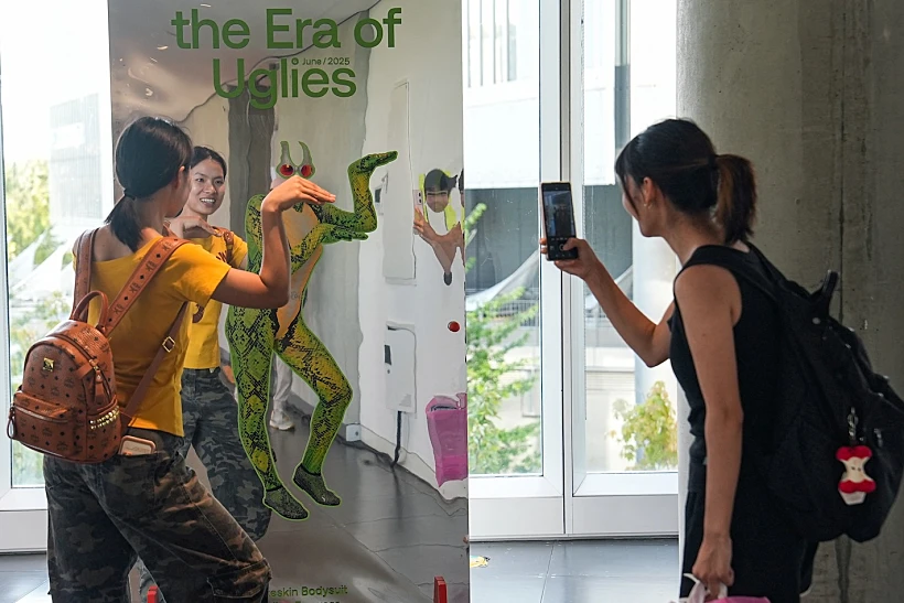 People Visit The Exhibition 'era Of Uglies Has Arrived' By Alibaba's Taobao, In Hangzhou