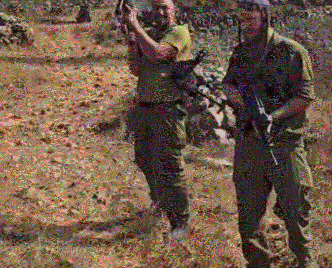 מתנחלים חמושים במדי צה"ל