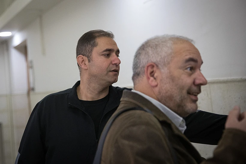 רונאל פישר וערן מלכה בבית המשפט