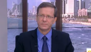 סערה בוועידה - ניצחון להרצוג