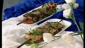 פרגיות  משופדות על מקל ארוך