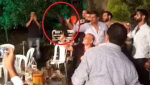 החתן יורה צרור באוויר - ופוגע בצלם