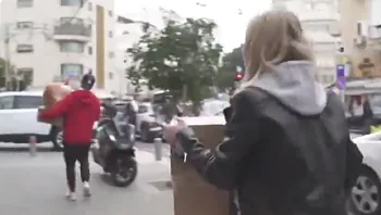 אחד מהניצולים האחרונים מהטבח בבאבי יאר - ונכדתו שאוספת תרומות לפליטים