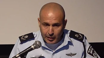 מפקד מחוז מרכז: "10,000 שב"חים ביום דרך פרצות בגדר"