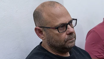 החשד נגד עד ההגנה במשפט רה"מ: שחיתות וקשר עם ארגוני פשע