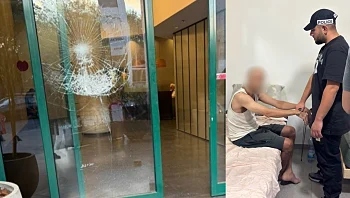 יומיים אחרי: נעצר חשוד בניפוץ דלת הכניסה לבניין חדשות 12