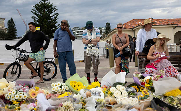 יום אבל לאומי באוסטרליה: המונים בטקס לזכר קורבנות הטבח בסידני | חדשות 13