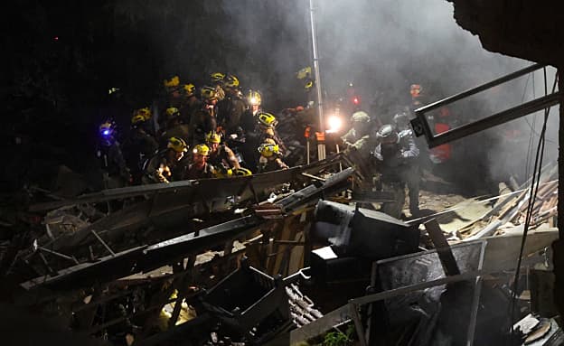 הרס וסריקות אחר 4 מנותקי קשר בחיפה: „הטיל פירק את הבניין” | חדשות 13