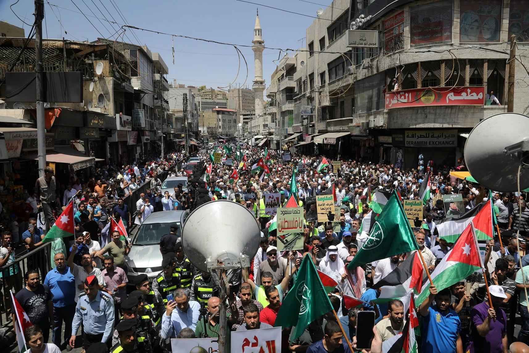 Jordanian Protesters Hold Jordanian National Flags As They Chant Slogans During A Protest Against U.s. President Donald Trump's ''deal Of The Century'' In Amman