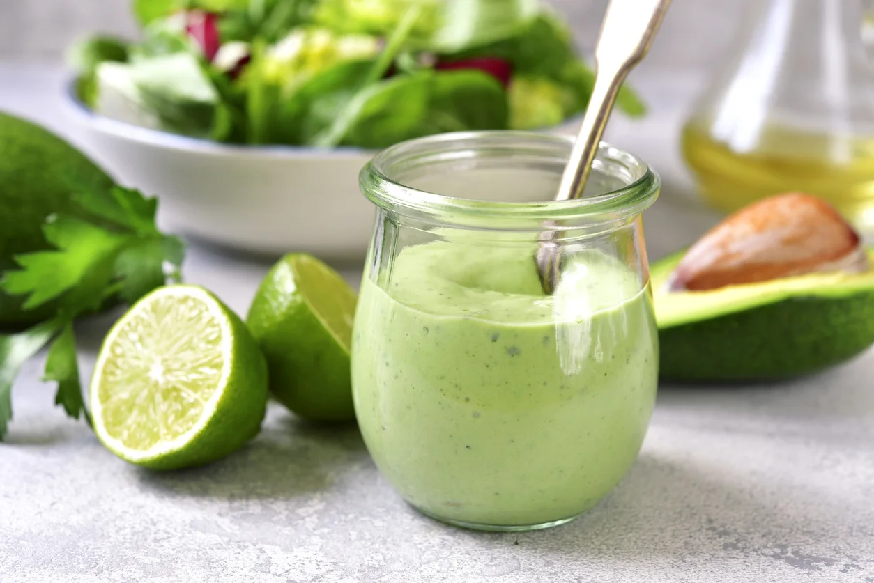 Homemade Avocado Yogurt Dressing In A Vintage Glass Jar