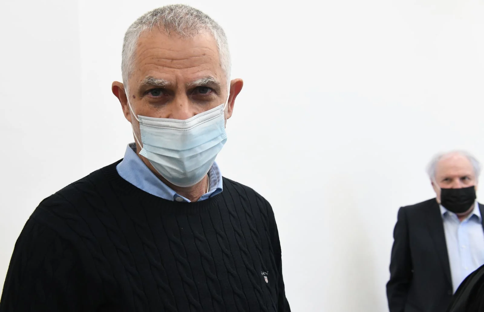 מו''ל ידיעות אחרונות נוני מוזס ובעל השליטה בבזק שאול אלוביץ' בבית המשפט
