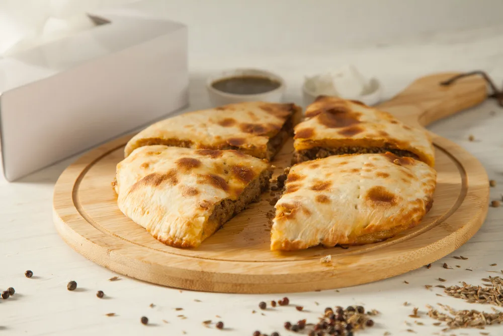 Stuffed,qeema,minced,meat,naan,with,herbs,and,spices,and