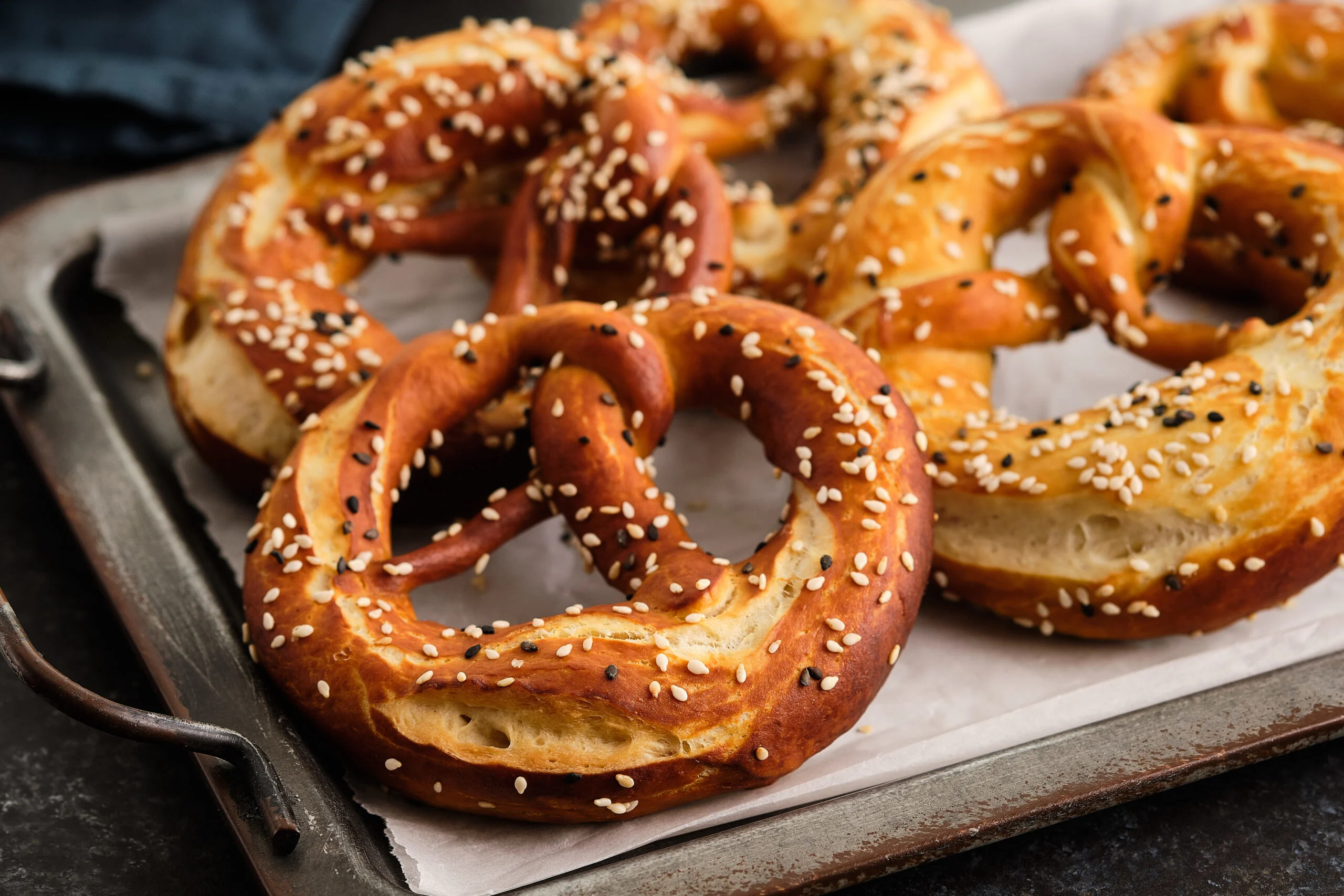 Homemade,whole,meal,pretzels,with,sesame,and,salt.,oktoberfest.