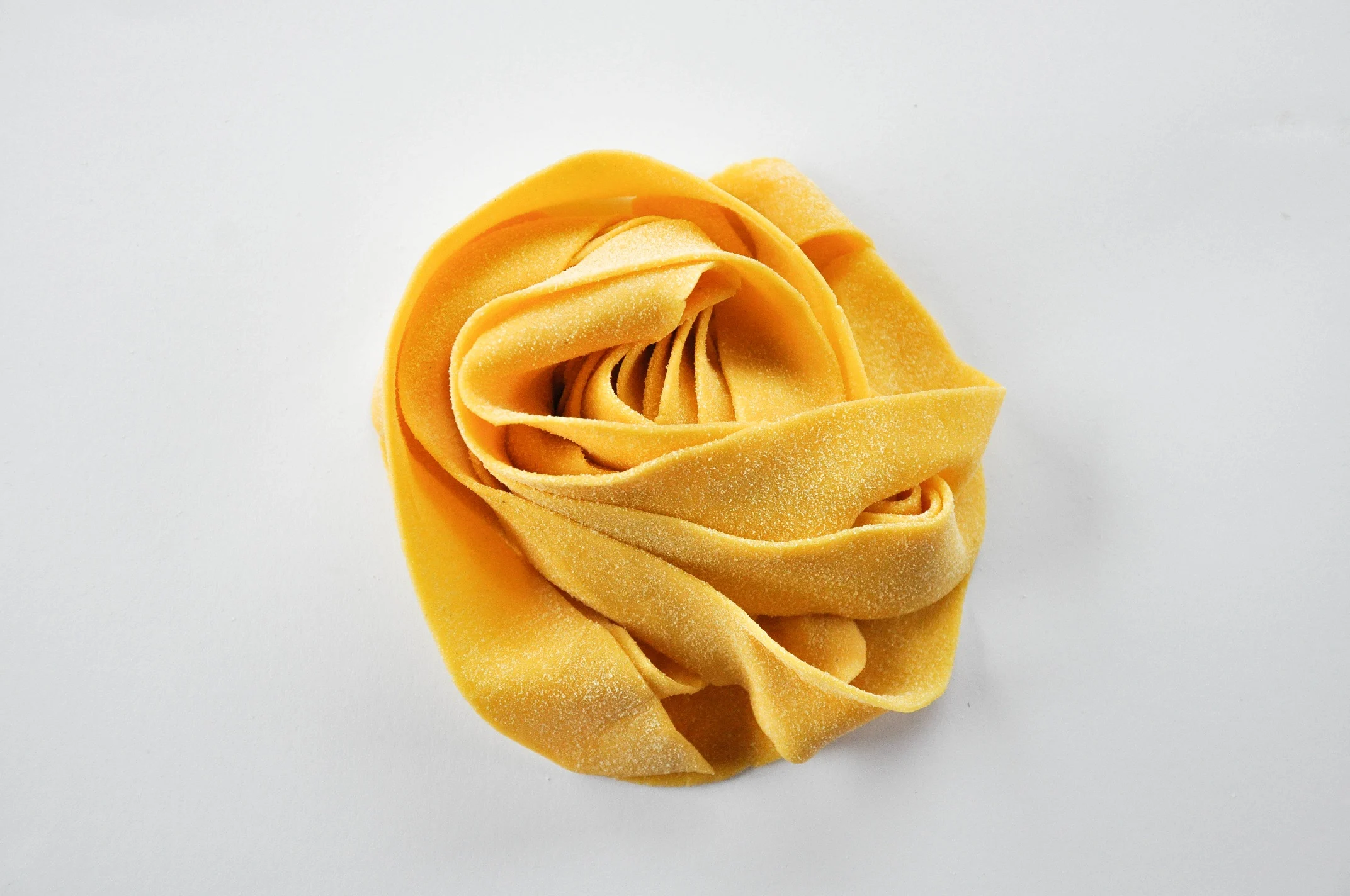 Handmade,pasta,pappardelle,isolated,white,background