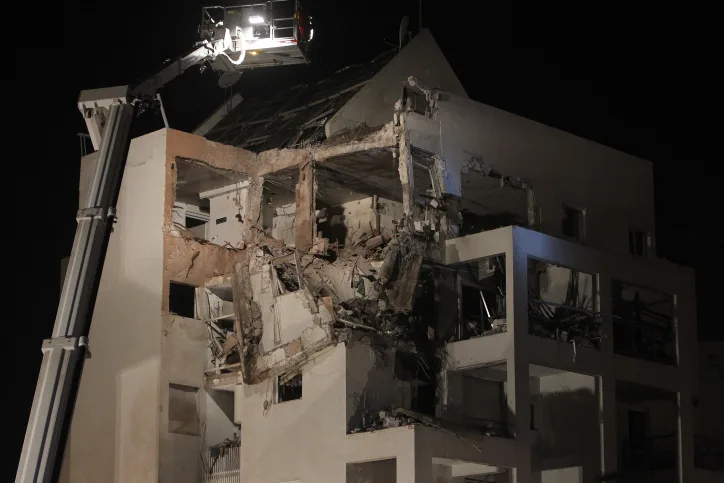 בניין שנפגע מרקטה במבצע עמוד ענן לפני עשור