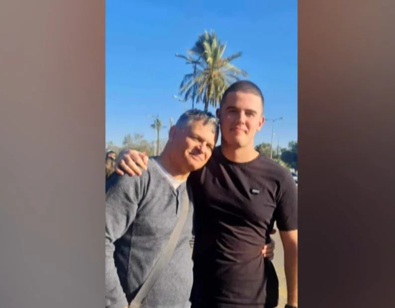 רון שרמן יחד עם אביו